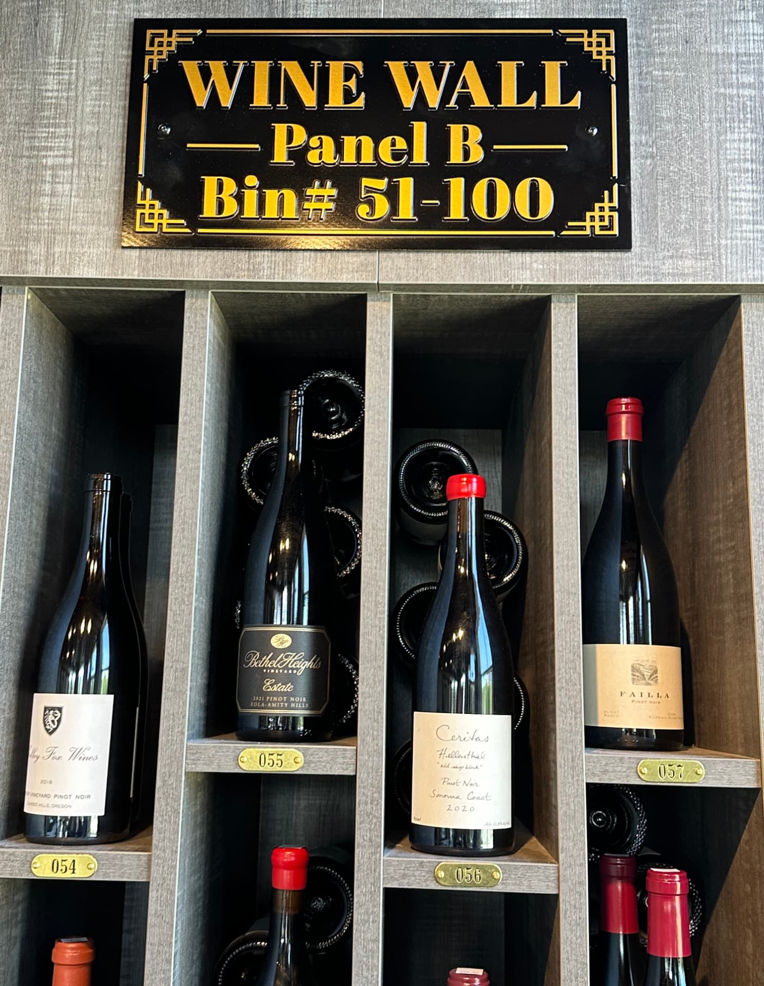 Wine Wall Panel B, bins 51-100, with numbered bottle cubbies